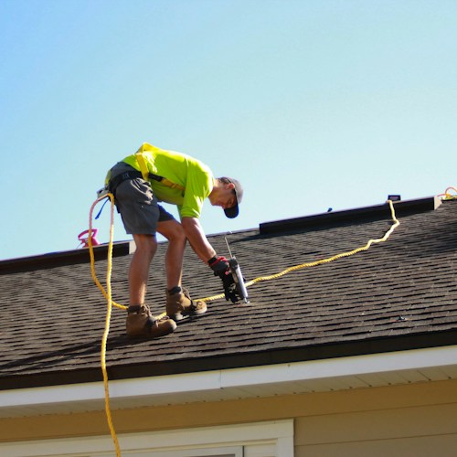 Roof repair, shingle replacement after wind damage