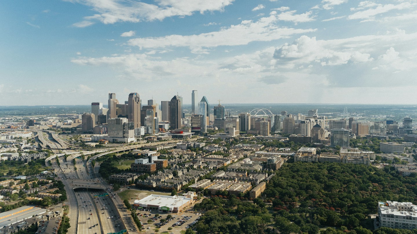 Aerial view of a residential neighborhood served by Slope Masters Roofing in Dallas, TX