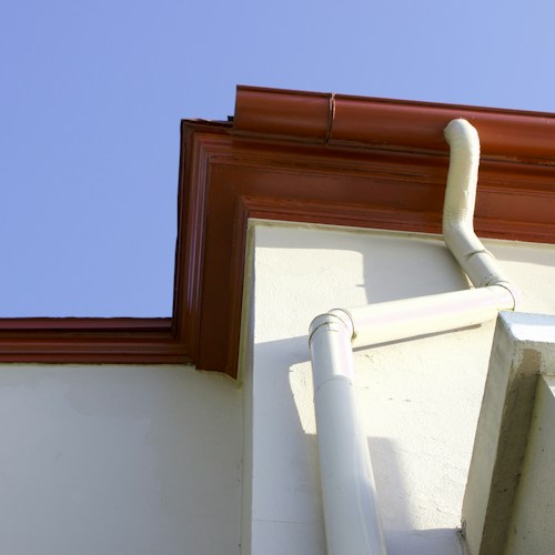 Seamless gutter installation, completed aluminum gutter system