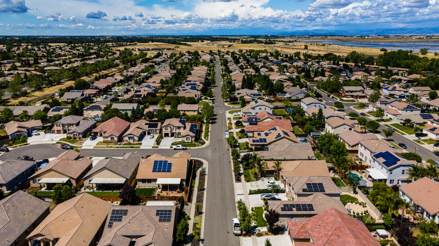 Aerial view of a residential neighborhood served by Slope Masters Roofing in Allen, TX